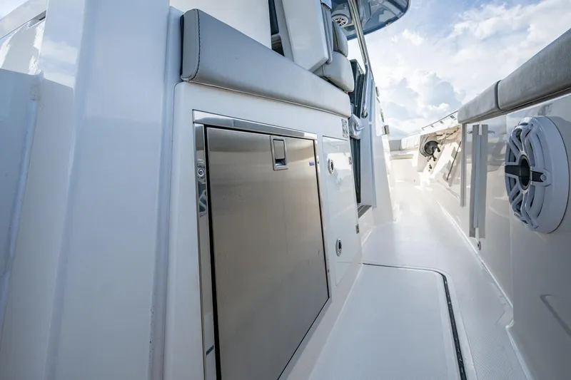 Island Girl II Yacht Photos Pics 2023 Pursuit S 358 Sport boat interior with sleek design and modern amenities.