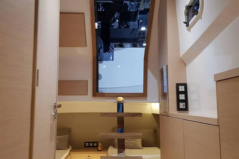  Yacht Photos Pics 2023 Tesoro T38 yacht interior with modern wood finish and sleek design elements.