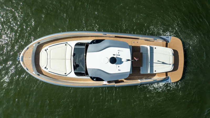  Yacht Photos Pics Aerial view of 2025 Solaris Power 44 Open yacht cruising on water.