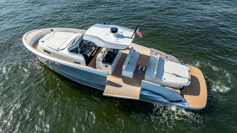  Yacht Photos Pics 2025 Solaris Power 44 Open yacht cruising on water, featuring sleek design and spacious deck.