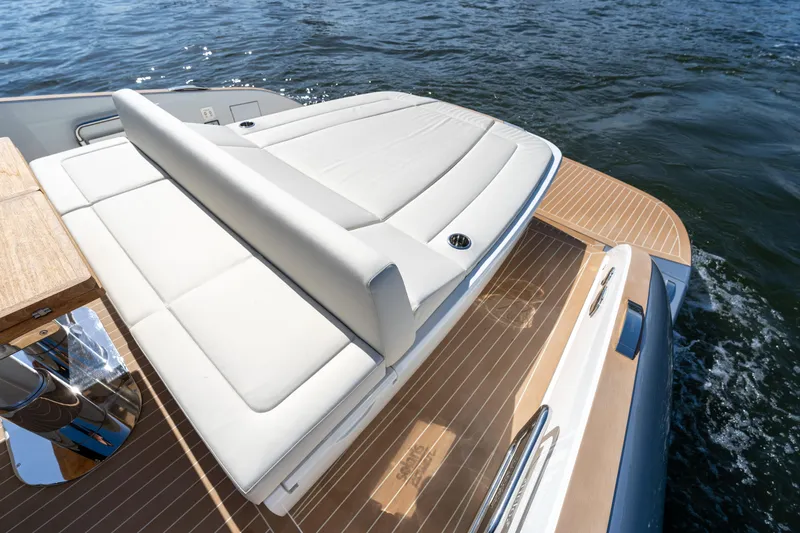  Yacht Photos Pics 2025 Solaris Power 44 Open yacht with sleek deck and luxurious seating on the water.