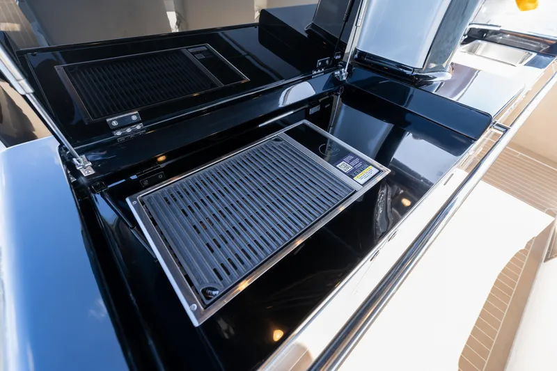 Yacht Photos Pics Outdoor grill on 2025 Solaris Power 44 Open yacht deck.