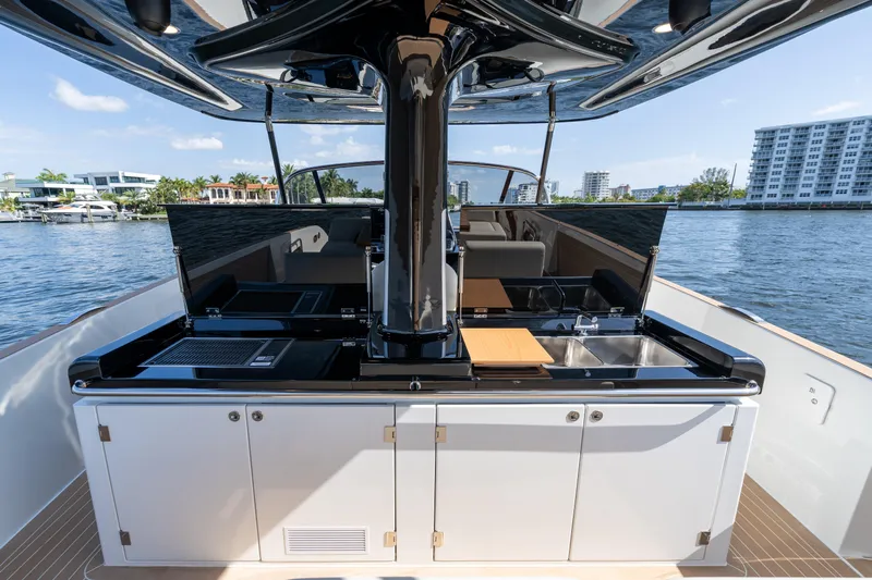  Yacht Photos Pics 2025 Solaris Power 44 Open yacht with sleek outdoor kitchen on deck.