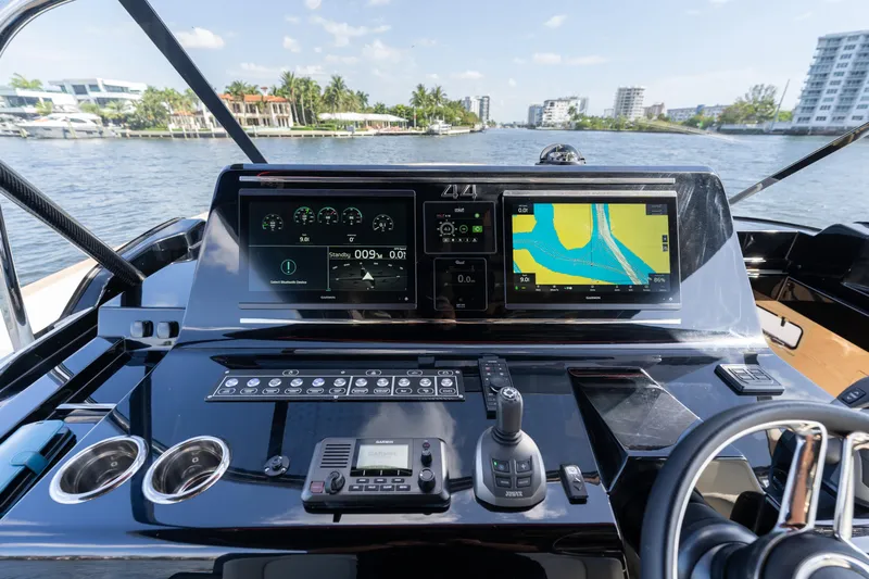  Yacht Photos Pics 2025 Solaris Power 44 Open yacht dashboard with navigation screens and controls.