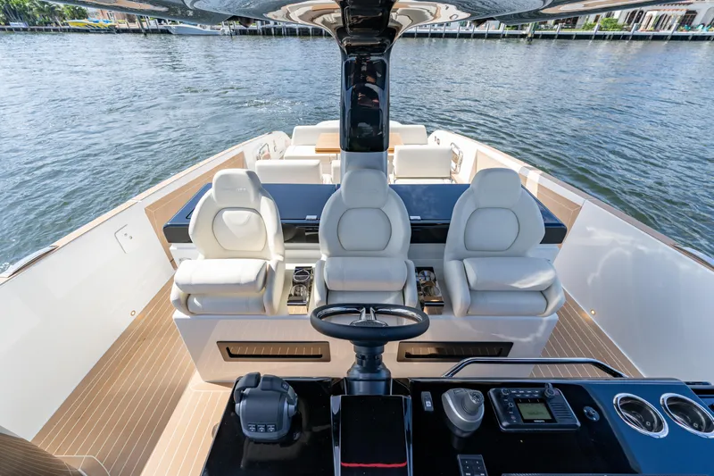  Yacht Photos Pics 2025 Solaris Power 44 Open yacht interior with luxurious seating and modern controls.