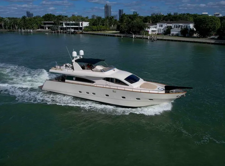 Boulos Yacht Photos Pics Luxurious 2003 Gianetti 86 yacht cruising on a serene waterway.
