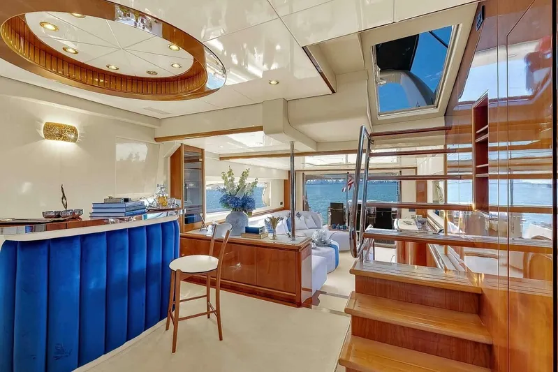 Boulos Yacht Photos Pics Luxurious interior of 2003 Gianetti 86 yacht with elegant wood finishes and modern furnishings.