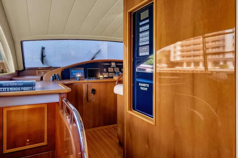 Boulos Yacht Photos Pics Luxurious 2003 Gianetti 86 yacht interior with polished wood and modern navigation controls.
