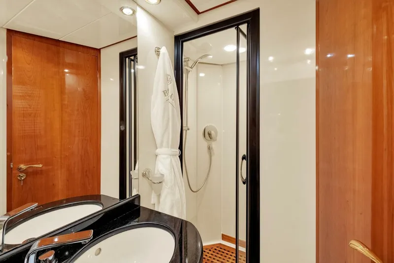 Boulos Yacht Photos Pics Luxurious bathroom on 2003 Gianetti 86 yacht with shower and dual sinks.