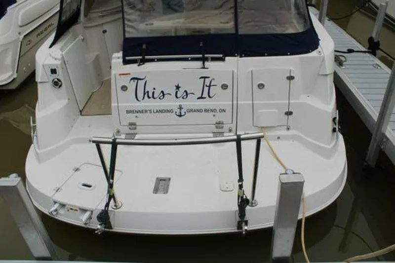  Yacht Photos Pics 2011 Four Winns V335 boat docked, rear view with "This is It" nameplate.