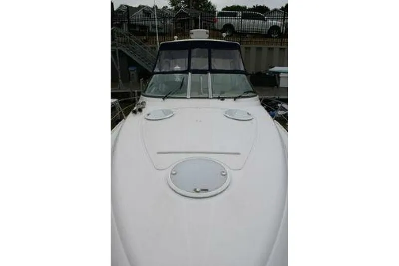  Yacht Photos Pics 2011 Four Winns V335 boat, front deck view, docked at marina.