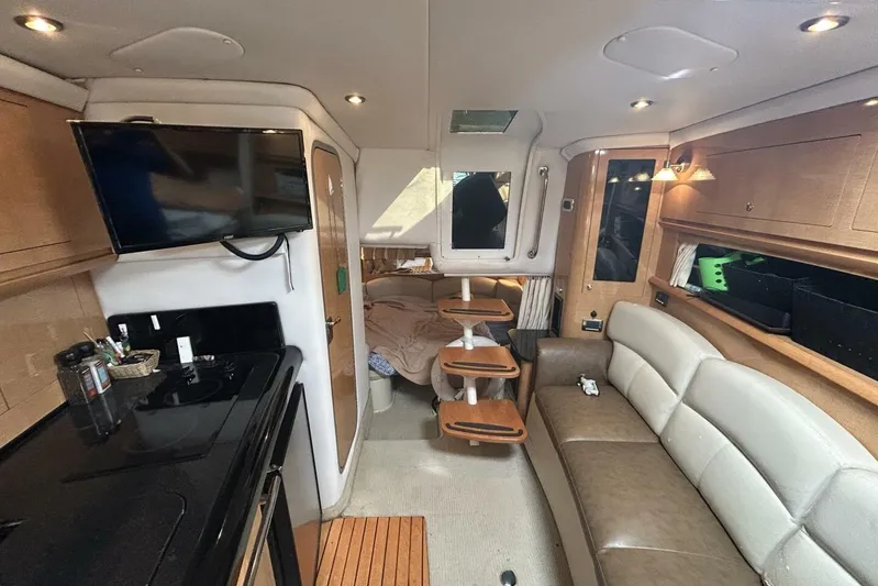  Yacht Photos Pics Interior of 2011 Four Winns V335 yacht with modern amenities and comfortable seating.