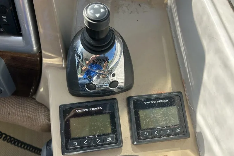  Yacht Photos Pics Control panel of a 2011 Four Winns V335 boat with Volvo Penta joystick.