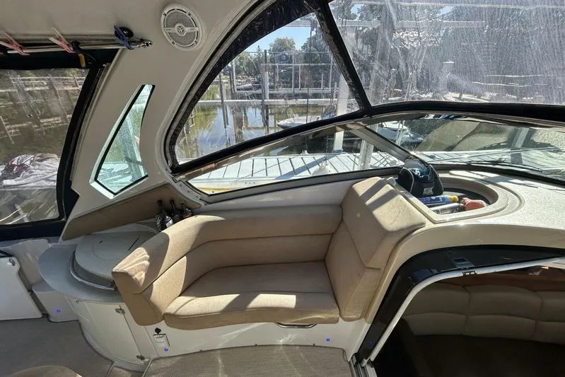  Yacht Photos Pics Interior of 2011 Four Winns V335 boat with beige seating and panoramic windows.