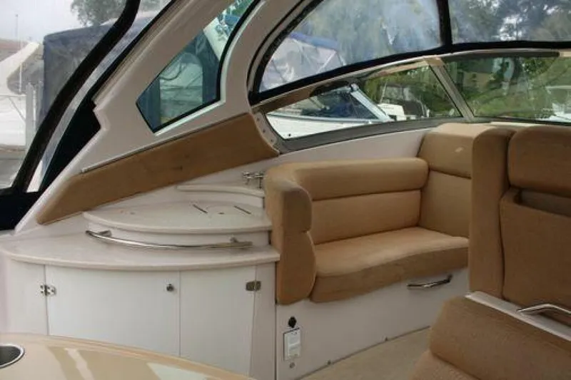  Yacht Photos Pics Interior of 2011 Four Winns V335 boat with beige seating and sleek design.