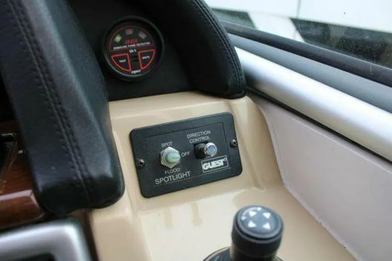  Yacht Photos Pics 2011 Four Winns V335 boat dashboard with spotlight control and gauge.