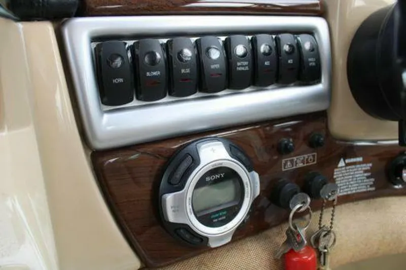  Yacht Photos Pics Control panel of 2011 Four Winns V335 boat with switches and Sony audio system.