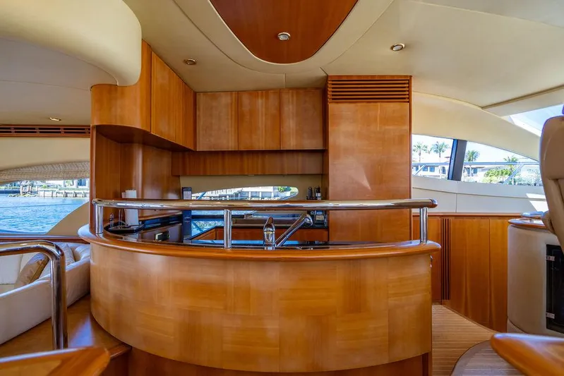 All In Yacht Photos Pics Luxurious interior of 2010 Azimut 62 Evolution Fly yacht with elegant wood finishes.