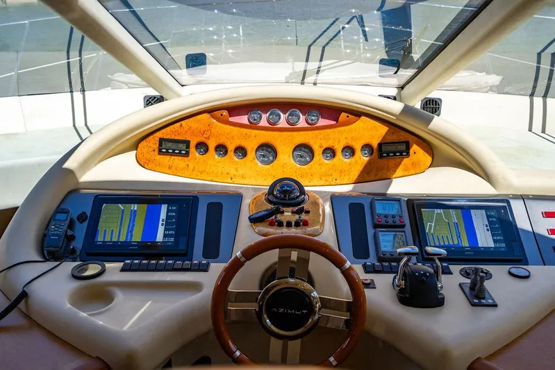All In Yacht Photos Pics Cockpit of 2010 Azimut 62 Evolution Fly yacht with advanced navigation controls and displays.