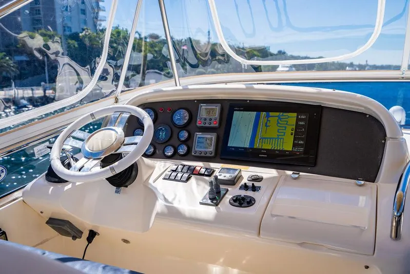 All In Yacht Photos Pics Cockpit of 2010 Azimut 62 Evolution Fly yacht with navigation controls and display.