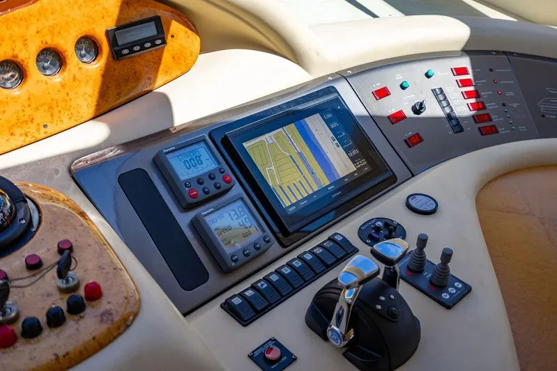 All In Yacht Photos Pics Control panel of 2010 Azimut 62 Evolution Fly yacht with navigation display and instruments.