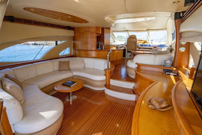 All In Yacht Photos Pics Luxurious interior of 2010 Azimut 62 Evolution Fly yacht with elegant seating and wood finishes.