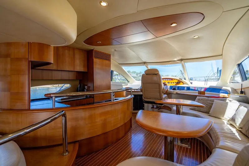 All In Yacht Photos Pics Luxurious interior of 2010 Azimut 62 Evolution Fly yacht with elegant wood finishes.