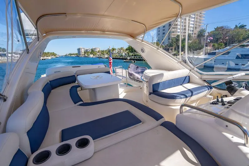 All In Yacht Photos Pics Luxurious 2010 Azimut 62 Evolution Fly yacht interior with plush seating and scenic waterway view.