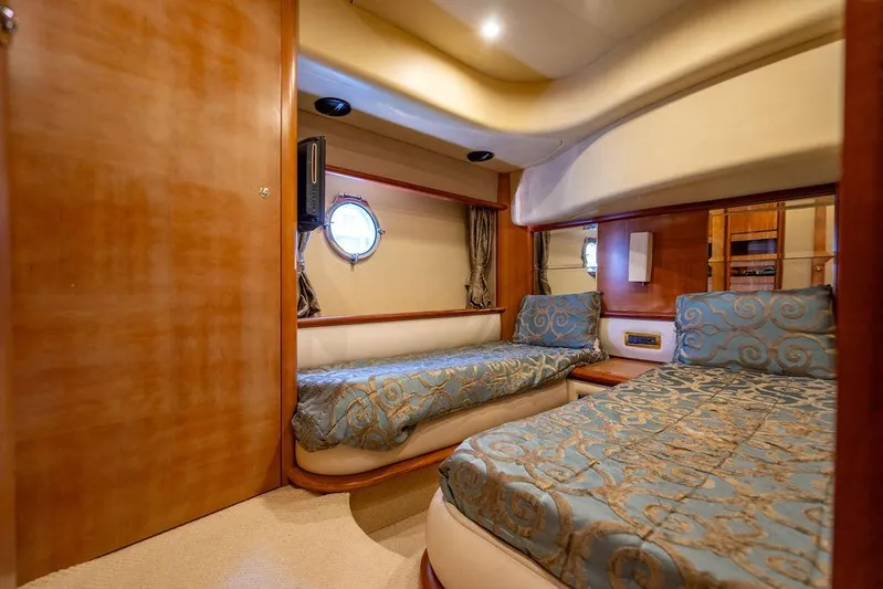 All In Yacht Photos Pics Luxurious cabin interior of 2010 Azimut 62 Evolution Fly yacht with twin beds.