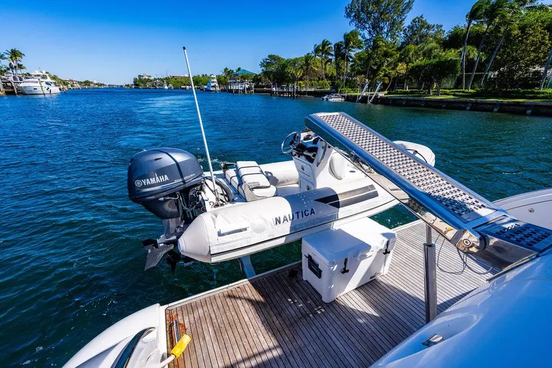 All In Yacht Photos Pics Azimut 62 Evolution Fly 2010 yacht with Yamaha motorboat on scenic waterway.