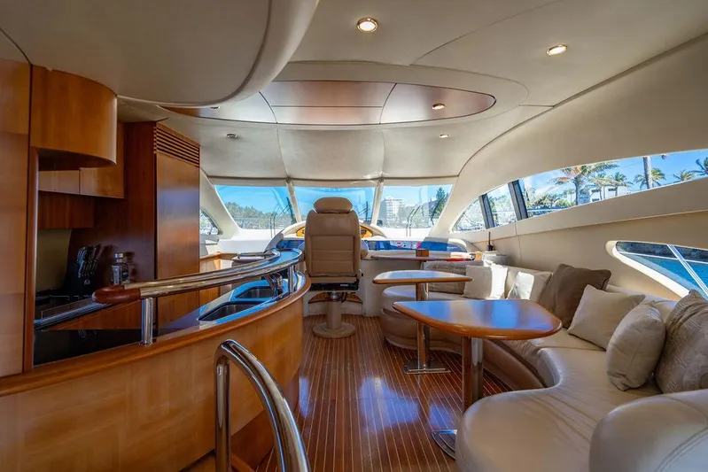 All In Yacht Photos Pics Luxurious interior of 2010 Azimut 62 Evolution Fly yacht with elegant seating and modern design.