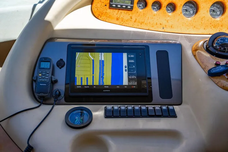 All In Yacht Photos Pics Control panel of 2010 Azimut 62 Evolution Fly yacht with navigation display and instruments.