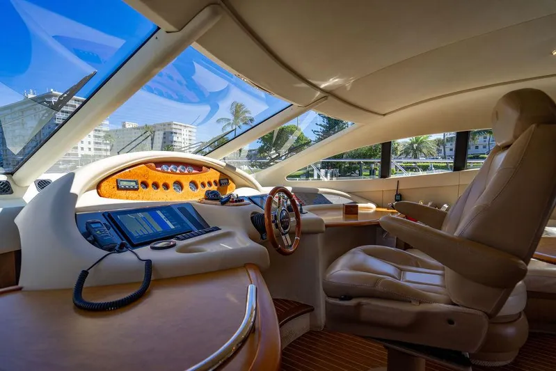All In Yacht Photos Pics Luxurious 2010 Azimut 62 Evolution Fly yacht interior with modern navigation controls.
