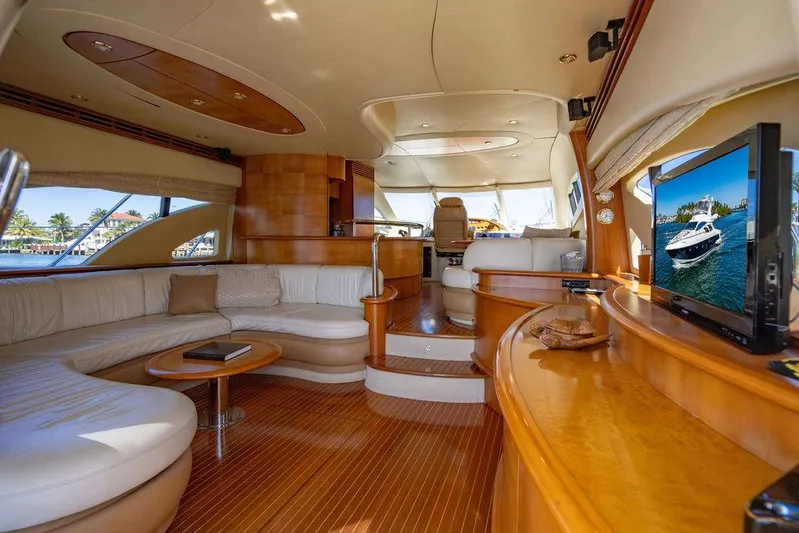 All In Yacht Photos Pics Luxurious interior of 2010 Azimut 62 Evolution Fly yacht with elegant seating and wooden finishes.