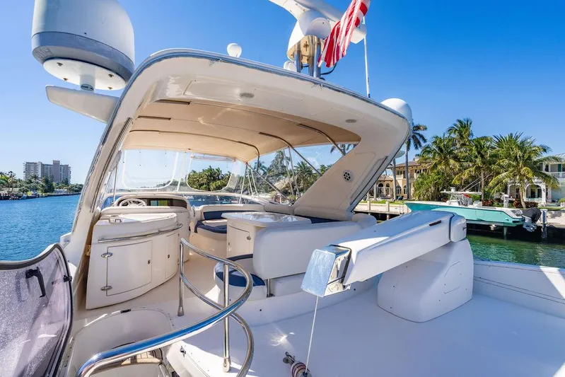 All In Yacht Photos Pics Luxurious 2010 Azimut 62 Evolution Fly yacht with elegant deck and waterfront view.