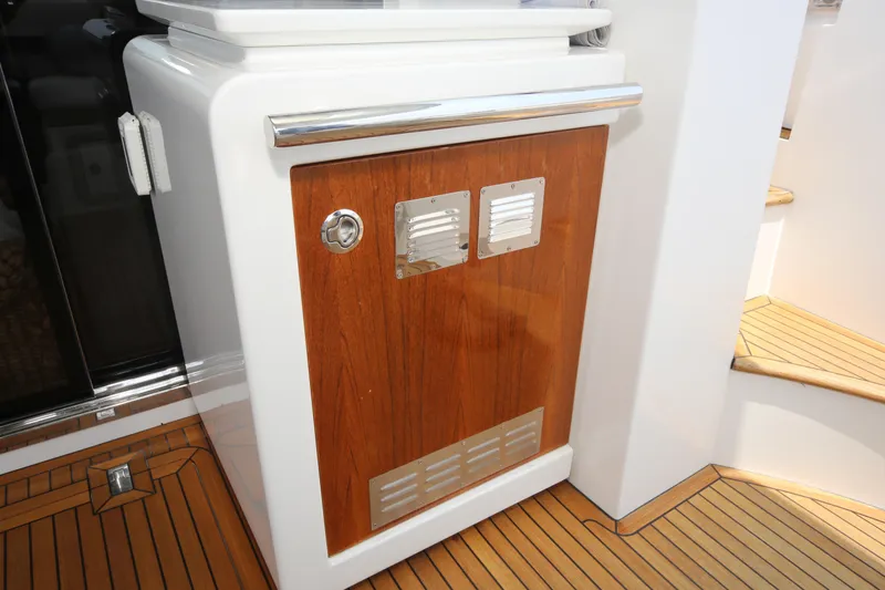 Kiki Yacht Photos Pics 2016 Azimut 66 yacht interior with wooden cabinet and sleek design.