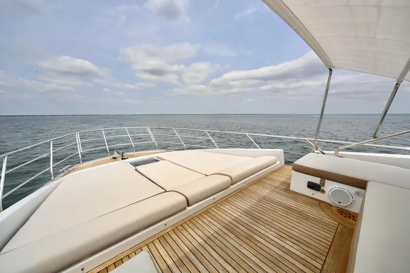 Kiki Yacht Photos Pics Luxury Azimut 66 yacht deck with sun loungers, ocean view, 2016 model.