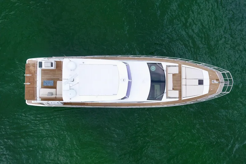 Kiki Yacht Photos Pics Overhead view of 2016 Azimut 66 yacht on green water.