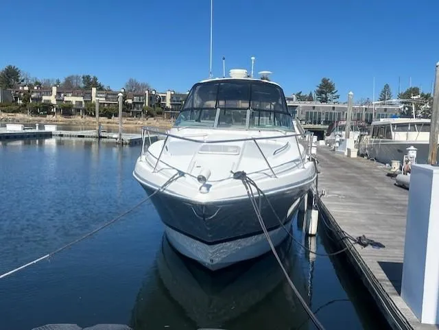  Yacht Photos Pics 2005 Formula 34PC boat docked at marina under clear blue sky.