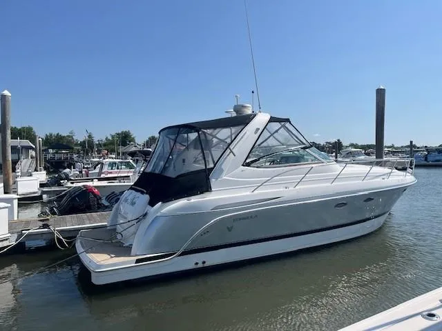  Yacht Photos Pics 2005 Formula 34PC yacht docked at marina under clear blue sky.