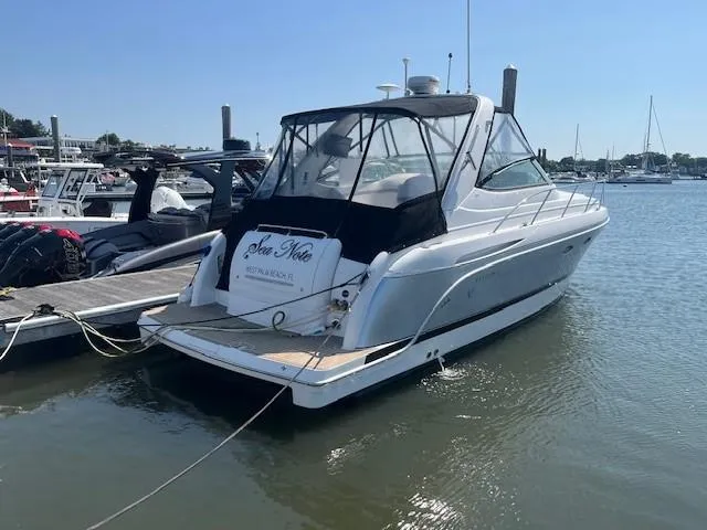  Yacht Photos Pics 2005 Formula 34PC yacht docked at marina under clear blue sky.