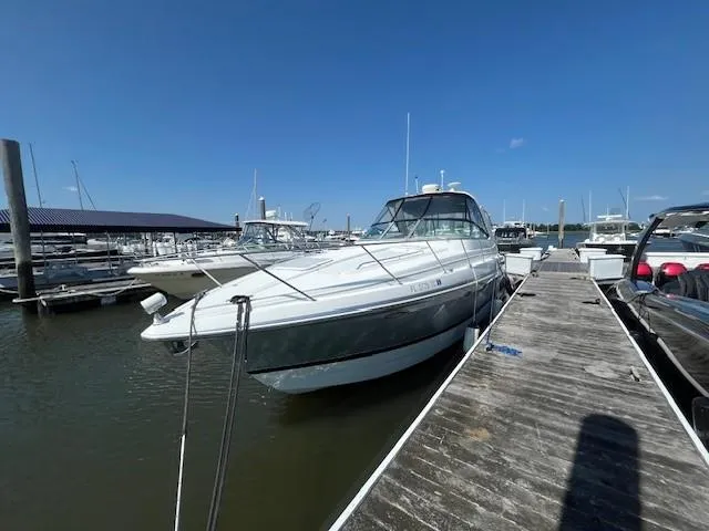  Yacht Photos Pics 2005 Formula 34PC yacht docked at marina under clear blue sky.