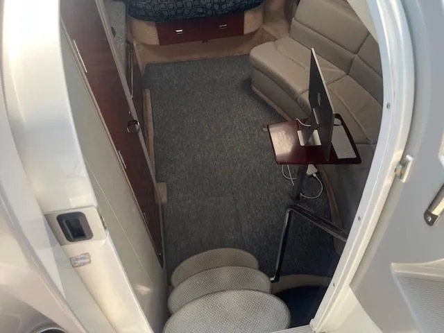  Yacht Photos Pics Interior of 2005 Formula 34PC yacht with seating and table setup.