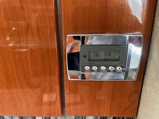  Yacht Photos Pics Digital thermostat on wood panel in 2005 Formula 34PC boat interior.