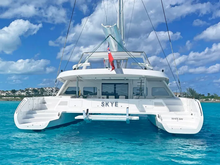 Skye Yacht Photos Pics Luxurious 2023 Mystique Yachts Silhouette 800 catamaran on turquoise waters.