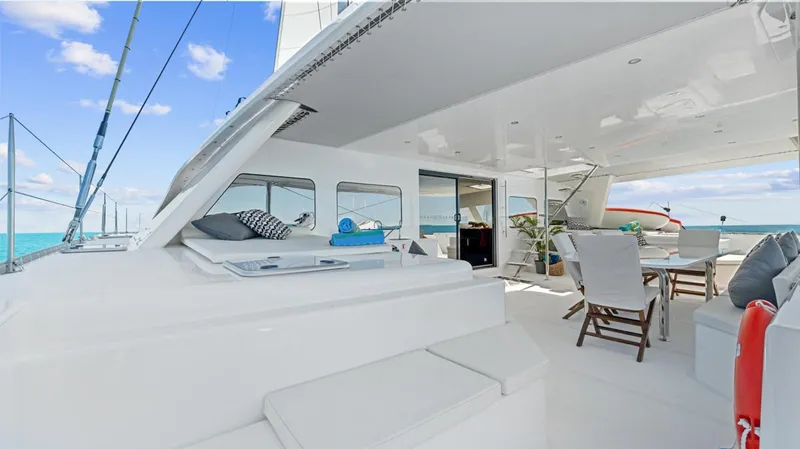 Skye Yacht Photos Pics Luxurious 2023 Mystique Yachts Silhouette 800 with spacious deck and elegant seating area.