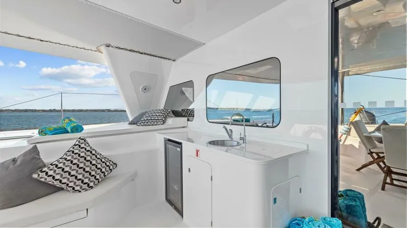 Skye Yacht Photos Pics Luxurious 2023 Mystique Yachts Silhouette 800 interior with ocean view and modern amenities.