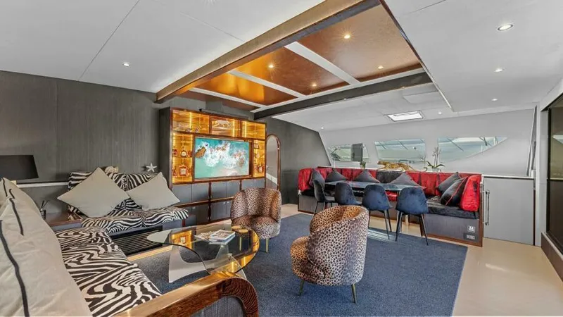 Skye Yacht Photos Pics Luxurious interior of 2023 Mystique Yachts Silhouette 800 with modern seating and elegant decor.