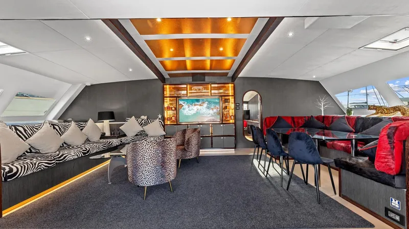 Skye Yacht Photos Pics Luxurious 2023 Mystique Yachts Silhouette 800 interior with elegant seating and modern decor.