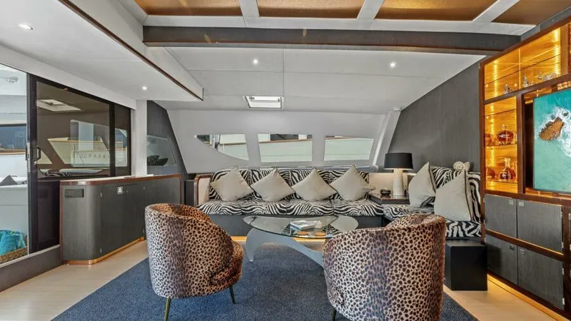 Skye Yacht Photos Pics Luxurious 2023 Mystique Yachts Silhouette 800 interior with modern decor and plush seating.